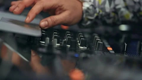 Closeup of DJ hands mixing, live performance party outside Stock Footage 130536047