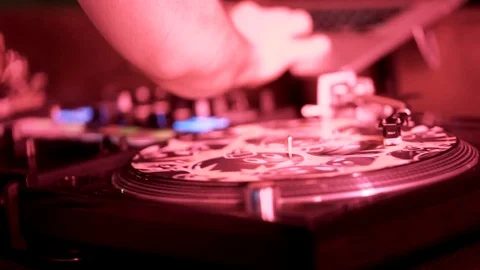 Closeup Of DJ Turn Tables During Party With Colorful Lights Stock Footage 91746329