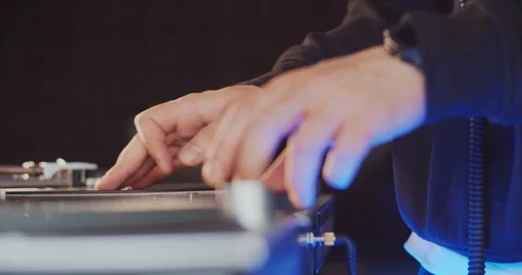 Closeup Dj turning knobs and levers, scratching vinyl record making new sound 스톡 동영상 113783577