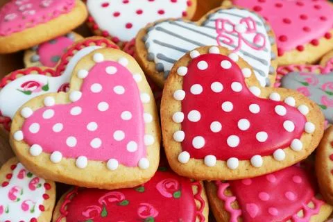 Closeup of dotted pattern heart shaped royal icing cookies for Valentine's day Stock Photos