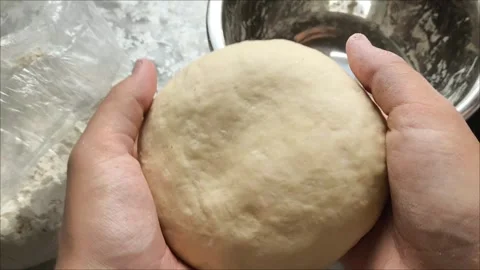 A closeup of the dough in his hands. Stock Footage 312249529