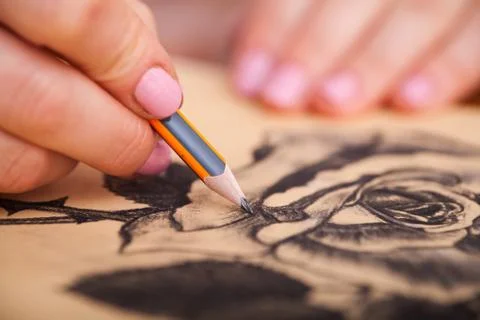 Closeup of drawing at the desk Stock Photos