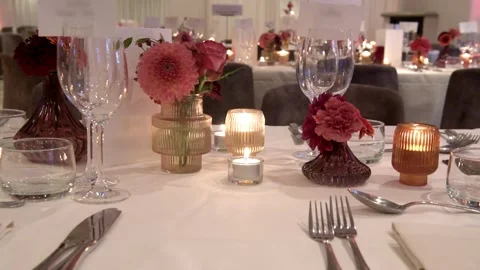 Closeup of a dressed table with candles Stock Footage 310780348