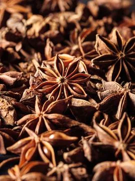 Closeup of dried aniseed on table Stock Photos