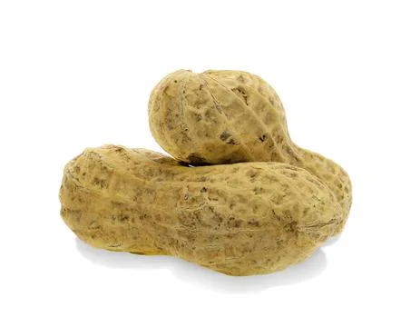 Closeup dried peanuts isolated on white background Stock Photos