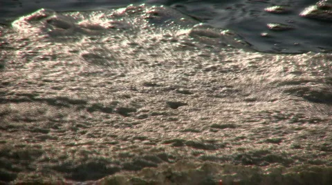 Closeup of drifting foam created by a waterfall (High Definition) Stock Footage 365100