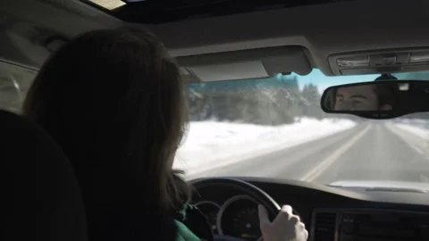 Closeup Of Driver Dancing Along To Music As He Drives Along Mountain Road Stock Footage 72330558