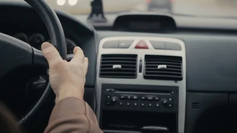 Closeup Of Driver's Hand On Steering Wheel Stock Footage 71128288