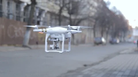 Closeup of a drone flying in the city Stock Footage 88165768