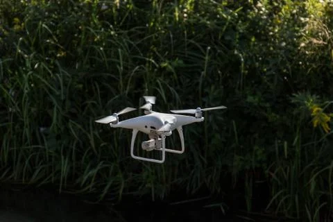 Closeup of a drone while flying in the countryside Stock Photos