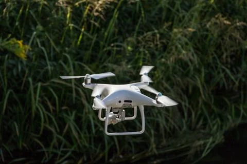 Closeup of a drone while flying in the countryside Stock Photos