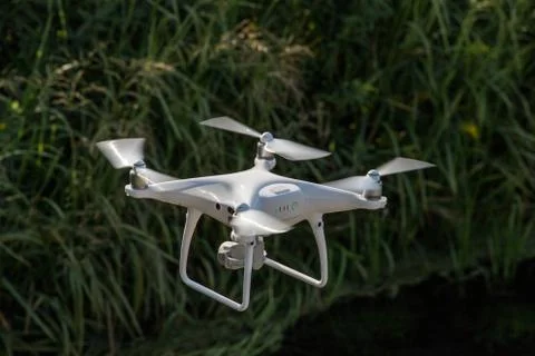 Closeup of a drone while flying in the countryside Stock Photos