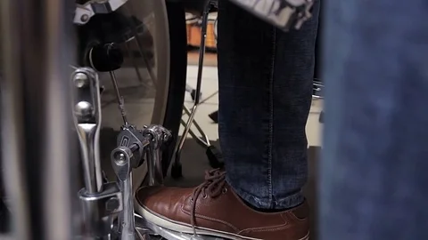 Closeup of drummer's foot moving drum bass pedal. Stock Footage 70821484