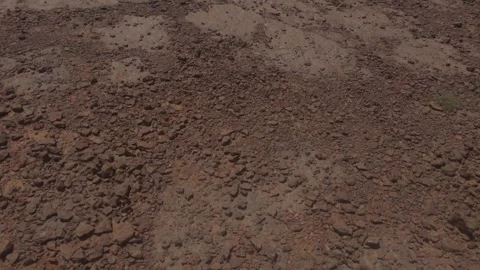 Closeup of dry rocky desert ground surface in Morocco Stock Footage 337780920