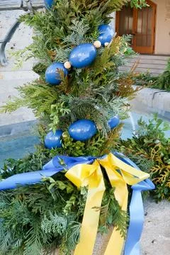 Closeup of easter decoration on a well in front of the St. Walburga Church, B Stock Photos