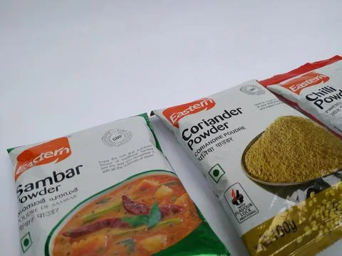 Closeup of Eastern Coriander, Chilly and Sambhar Powder Pouch isolated on w.. Stock Photos