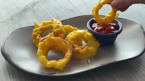 Closeup of Eating Deep Fried Onion Rings Stock Footage 316908960