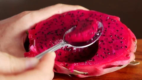 Closeup of Eating Fresh Dragon Fruit for Dessert Stock Footage 71836881