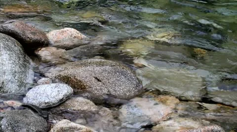 Closeup of the edge of a river in Idaho Stock Footage 10750026