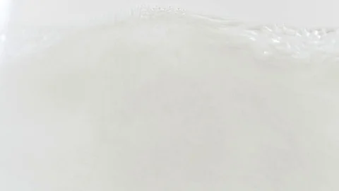Closeup Of Effervescent Bubbles Climbing the Side of a Glass Stock Footage 74610663