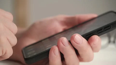 Closeup elderly man hands with mobile phone. elderly person enters graphic key. Stock Footage 242023841