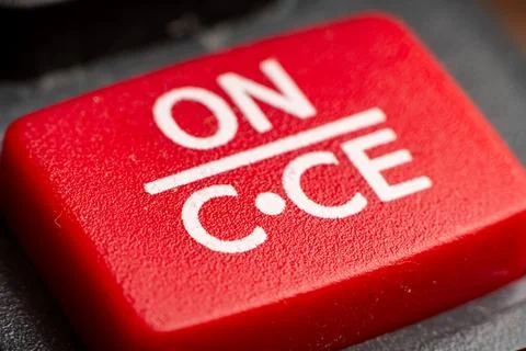 Closeup of an electronic calculator button highlighting the on/off function Stock Photos