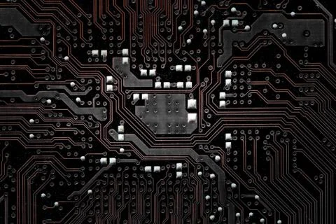 Closeup electronic circuit board background. Stock Photos