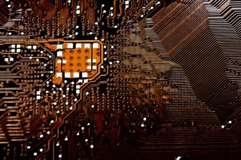 Closeup electronic circuit board background. Stock Photos