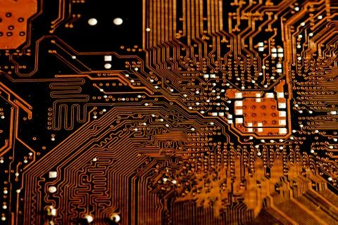 Closeup electronic circuit board background. Stock Photos