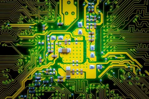 Closeup electronic circuit board background. Stock Photos