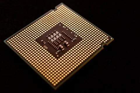 Closeup of an electronic circuit board with a processor. Stock Photos