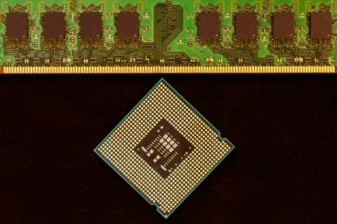 Closeup of an electronic circuit board with a processor. Stock Photos