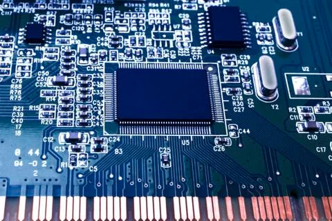 Closeup of an electronic circuit board with a processor. Stock Photos
