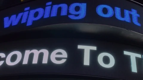 Closeup of Electronic News Ticker Scrolling News Stories in Times Square (NYC) Stock Footage 101308725