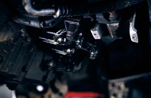 Closeup of the elements of car motor on black background Stock Photos