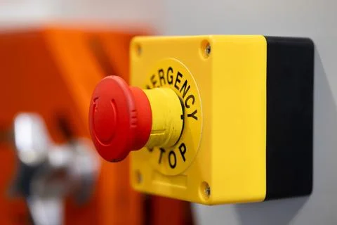 Closeup emergency stop button of danger machine, stop and solving problem i.. Foto stock