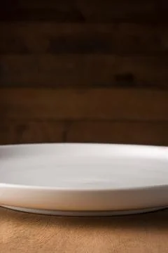 Closeup empty white plate, background Stock Photos