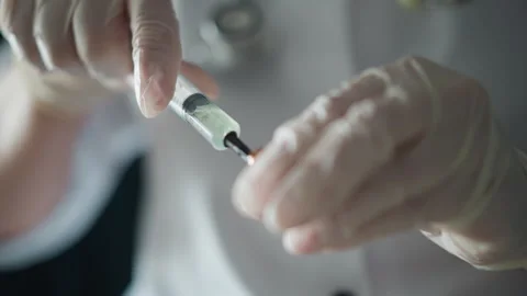Closeup emt hands preparing syringe in ambulance environment, quick precise Stock Footage 346557035
