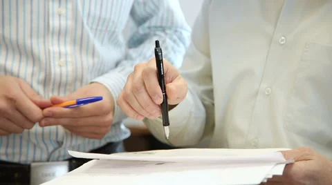 Closeup Engineers in the office to discuss the documents Stock Footage 63131916
