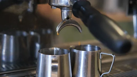 Closeup of espresso pouring from coffee machine Stock Footage 204461096