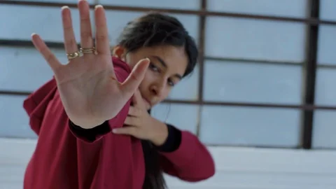 Closeup Of Expressive Dancer Freestyling In Studio Stock Footage 122363104