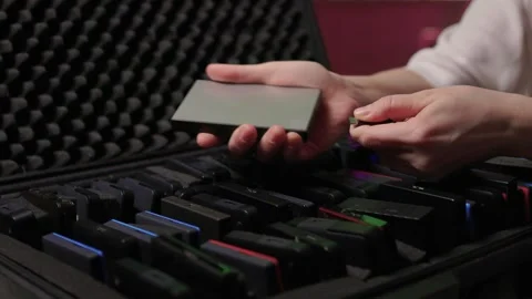 Closeup of external hard drive being connected to desktop computer. Modern Stock Footage 347874445