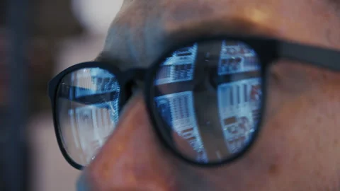 Closeup of Eyeglasses Reflecting Server Racks in a Data Center Stock Footage 348696497