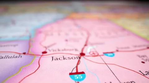 Closeup Of Fabric-textured Map Highlighting Jackson And Vicksburg In Stock Footage 307486777