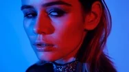 Closeup Face Of Beautiful Brunete Woman In Neon Light Red And Blue. Slow Mo Stock Footage