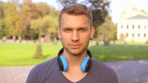 Closeup face cheerful student at the open air Stock Footage 99862981
