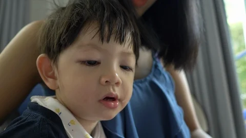 Closeup face of cute child sick with common cold Stock Footage 96252863