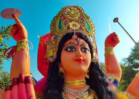 Closeup of face of Goddess Durga, Navratri, Hindu festival. Stock Photos