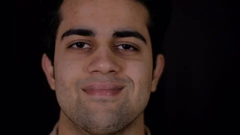 Closeup face of a man smiling and content  Stock Footage 104900565