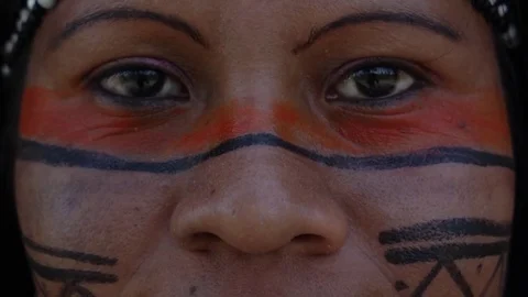 Closeup face of Native Brazilian Woman at an indigenous tribe in the Amazon Stock Footage